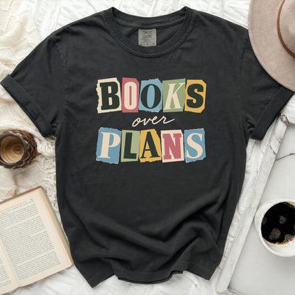 Charcoal t-shirt with "BOOKS over PLANS" in colorful cut-out letters.