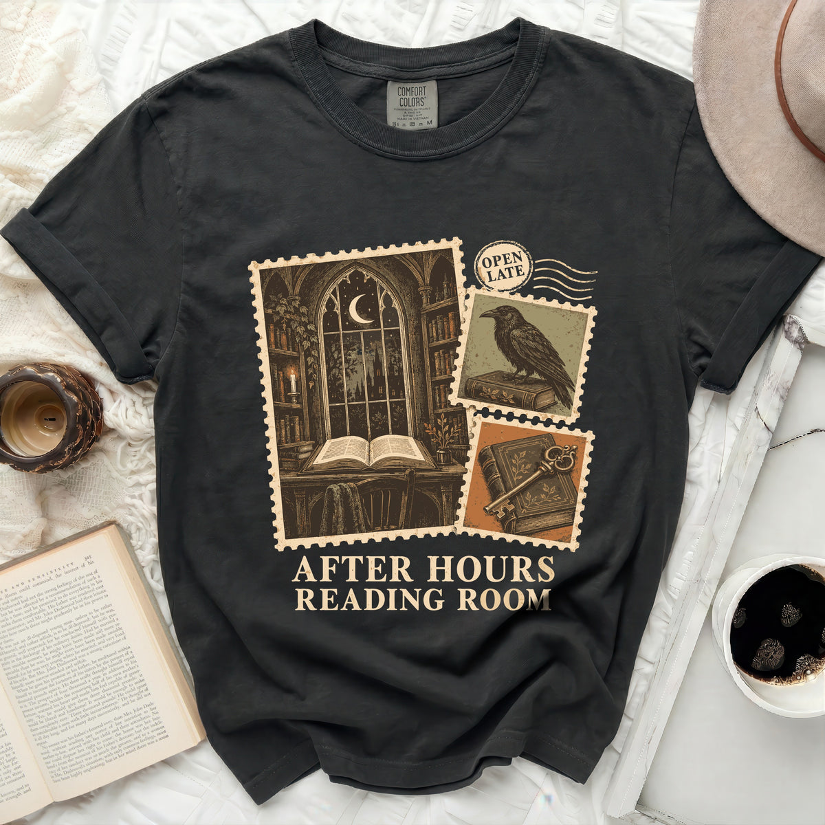 Dark grey t-shirt with "After Hours Reading Room" text and postage stamp graphics.