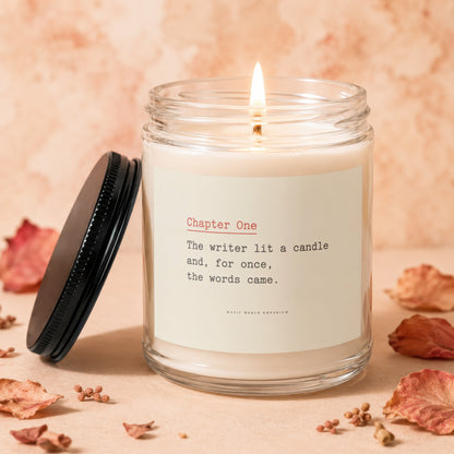 Candle with lit wick, black lid, and text "Chapter One" and "The writer lit a candle".