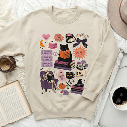 Crewneck sweatshirt with Halloween and book-themed graphic elements.