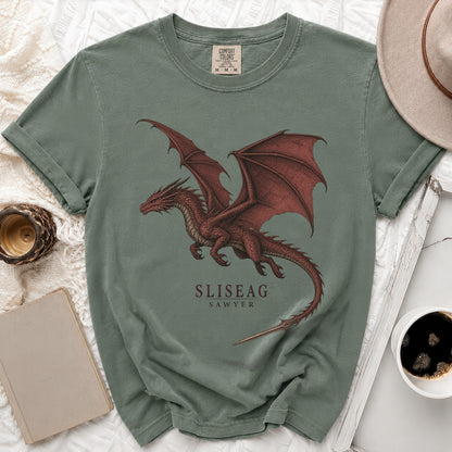 Green t-shirt with red dragon graphic and "SLISEAG SAWYER" text.