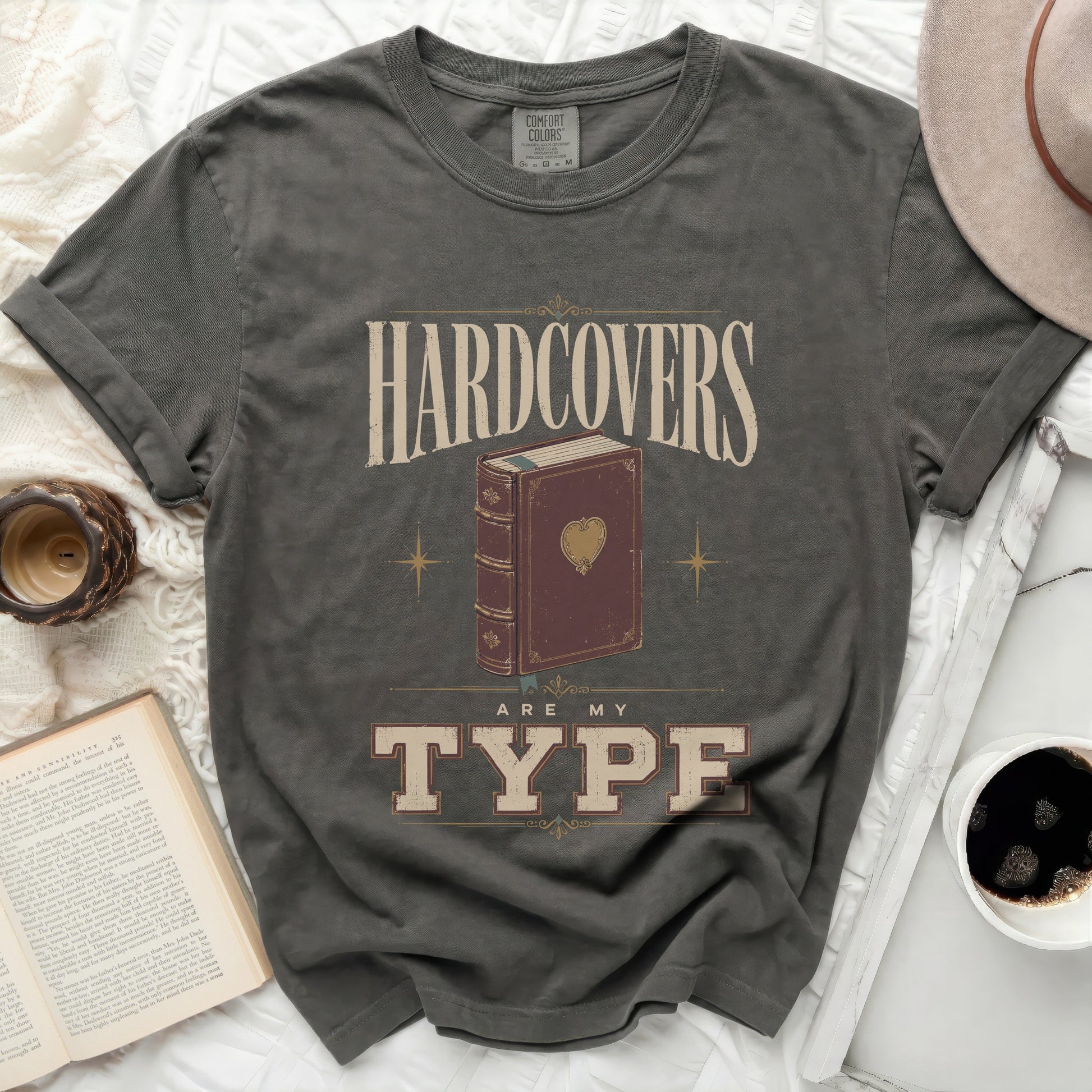 T-shirt with "Hardcovers Are My Type" text and a book graphic.