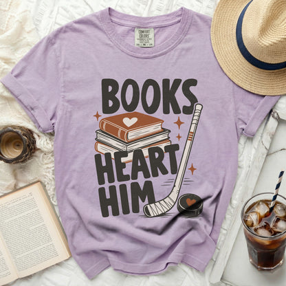 Books Heart Him text on a lavender t-shirt with hockey elements.