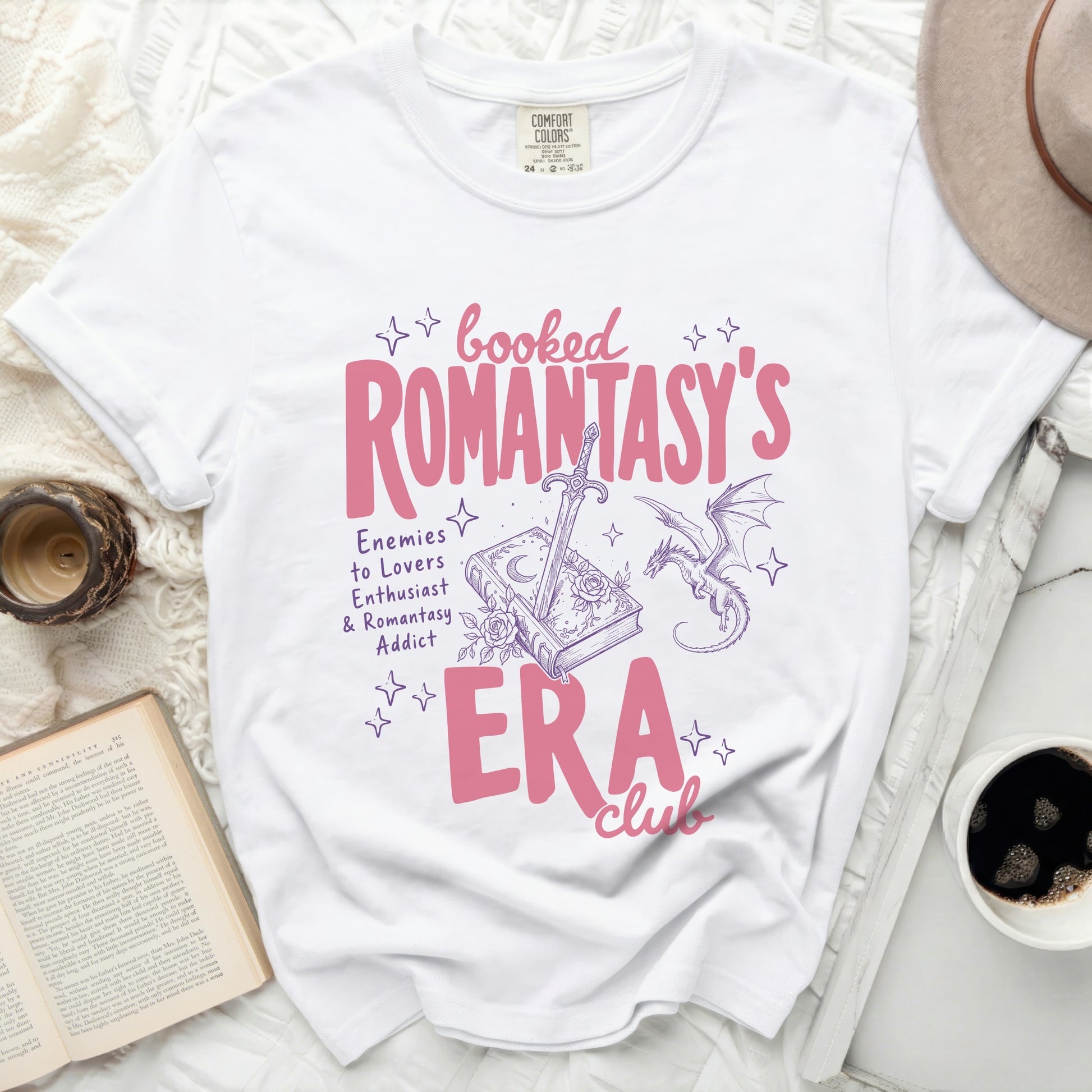 White t-shirt with "Booked Romantasy's Era Club" graphic.
