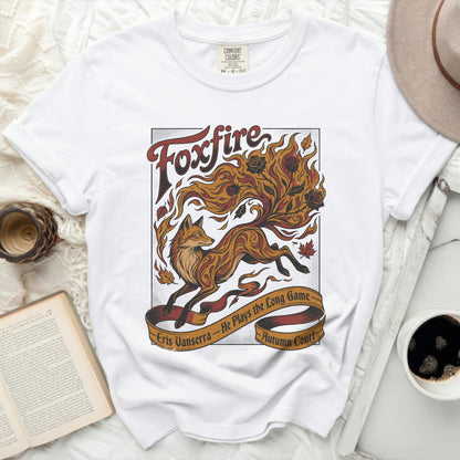 White t-shirt with "Foxfire" and a fox design, "Eris Vanserra - He Plays the Long Game - Autumn Court".