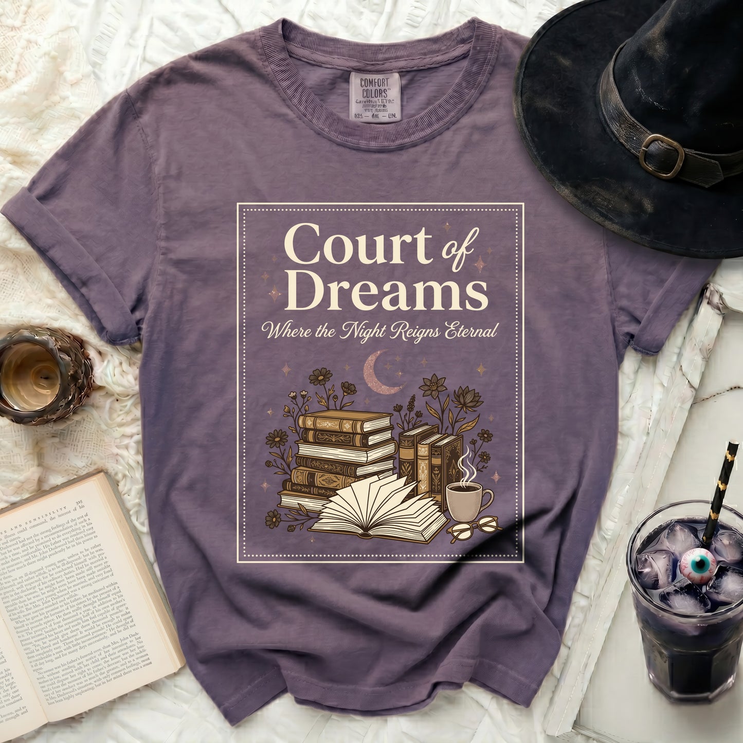 Purple t-shirt with "Court of Dreams" book-themed graphic and literary elements.
