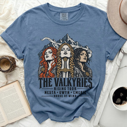 Blue t-shirt featuring "The Valkyries Rising Tour" with names Nesta, Gwyn, Emerie.