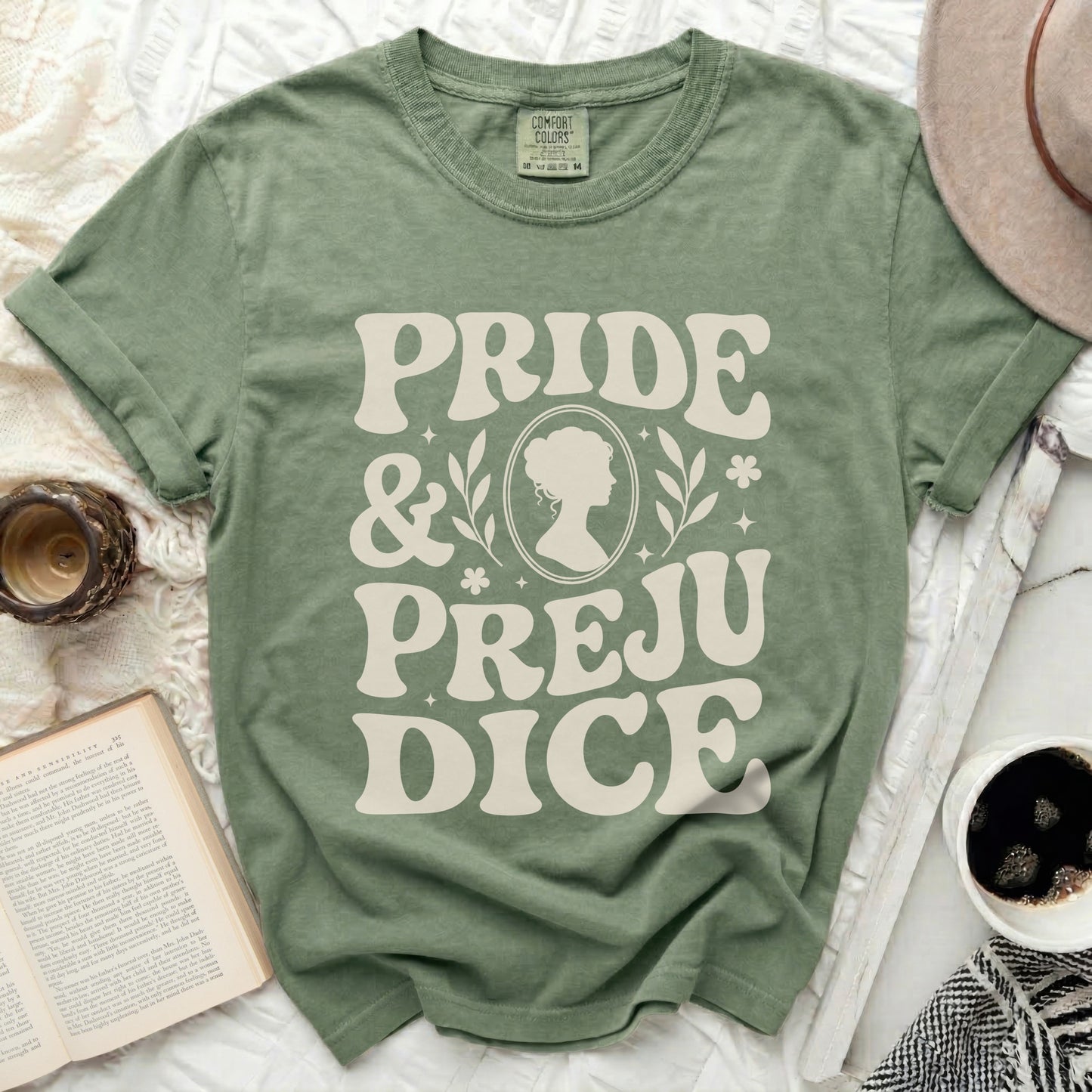 Green T-shirt with "Pride & Prejudice" text and silhouette