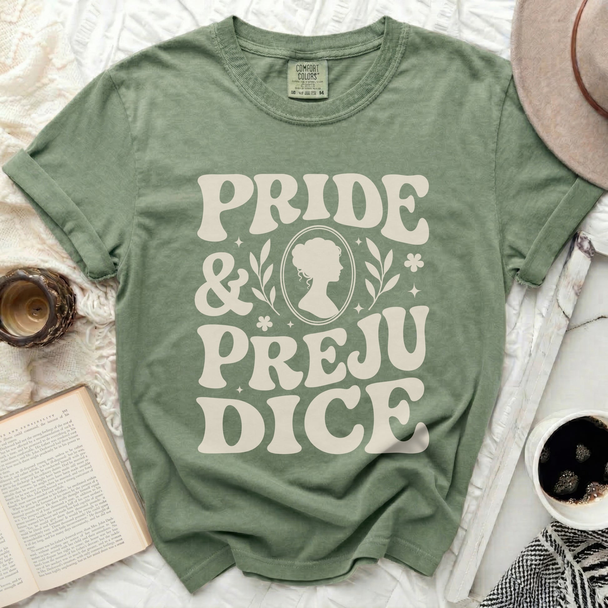 Green T-shirt with "Pride & Prejudice" text and silhouette