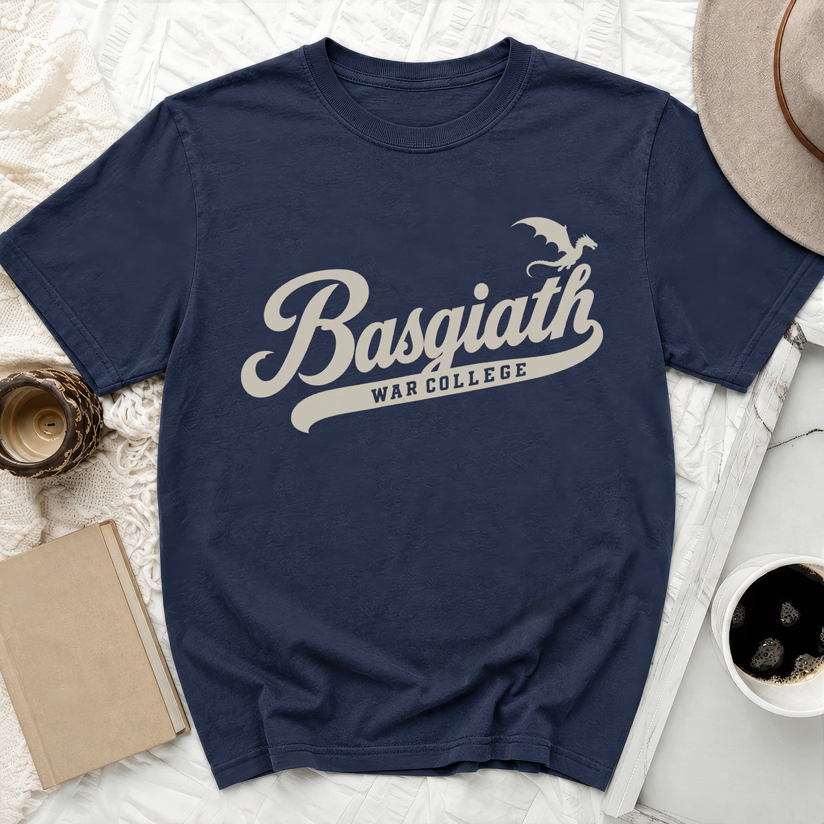 Navy t-shirt with Basgiath War College dragon graphic in cream.