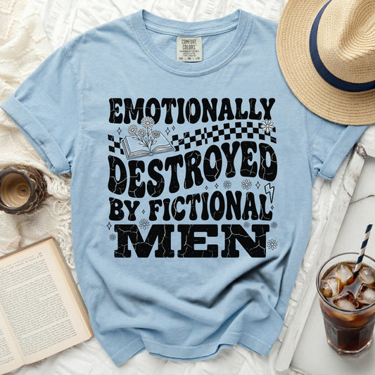 Light blue t-shirt with "EMOTIONALLY DESTROYED BY FICTIONAL MEN" graphic.