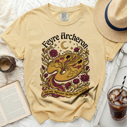 Yellow t-shirt with "Feyre Archon" text and floral art.