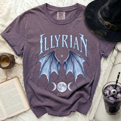 Purple t-shirt with "ILLYRIAN" text, bat wings, and moon phases graphic.