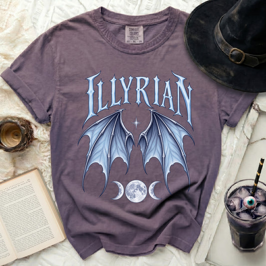 Purple t-shirt with "ILLYRIAN" text, bat wings, and moon phases graphic.