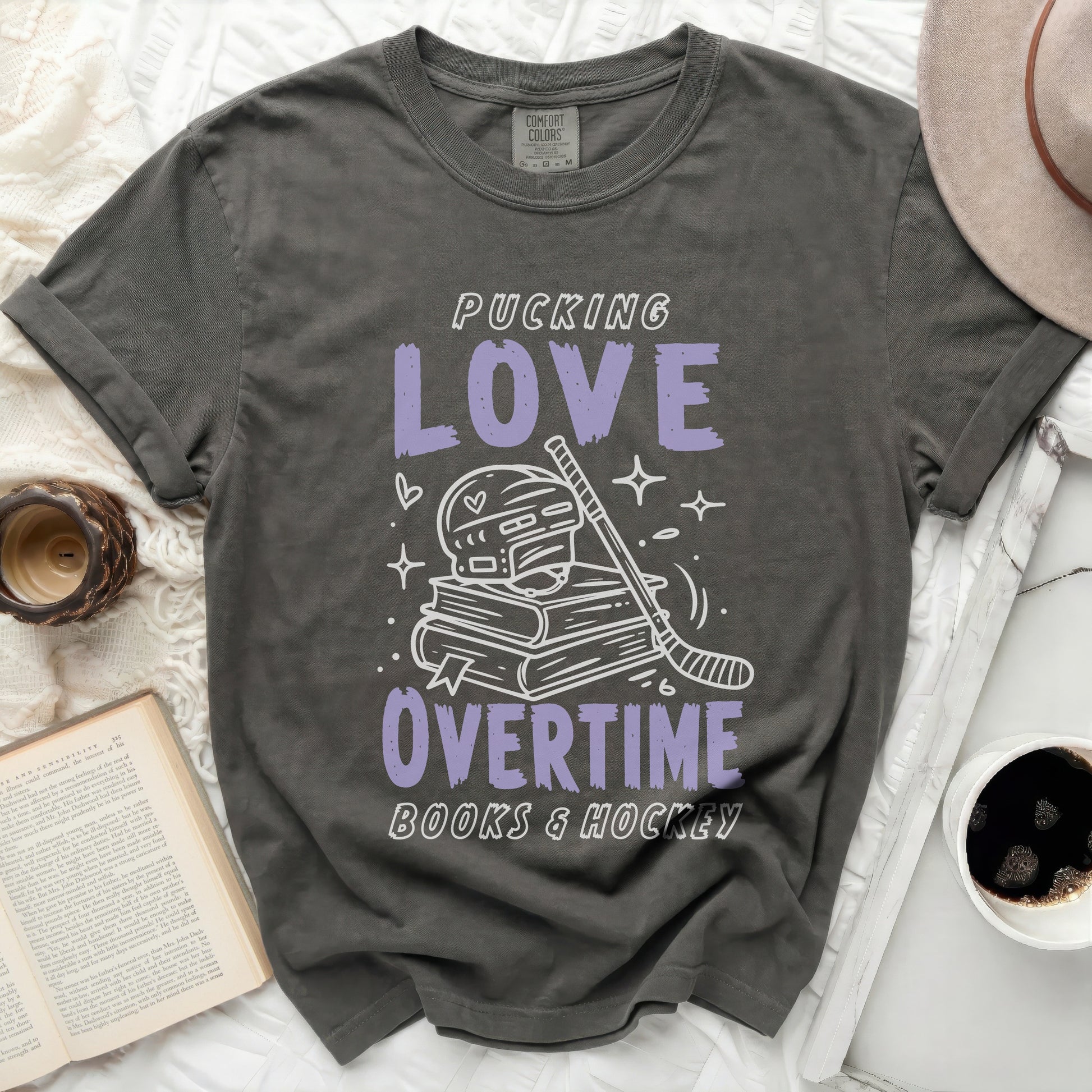 Grey t-shirt with "Pucking Love Overtime Books & Hockey" graphic.