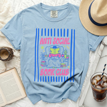 Light blue t-shirt with "ANTI SOCIAL BOOK CLUB" graphic.