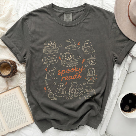 Dark gray t-shirt with "spooky reads" and Halloween illustrations.
