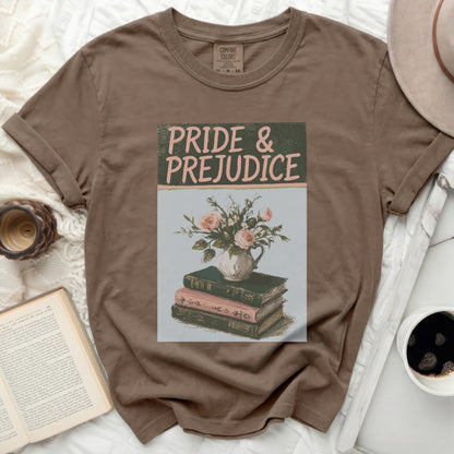 T-shirt with "Pride & Prejudice" title and floral arrangement over books.