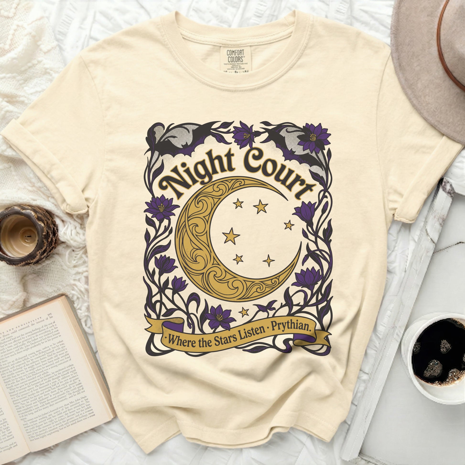 Cream t-shirt with "Night Court" and moon graphic, "Where the Stars Listen - Prythian" text.