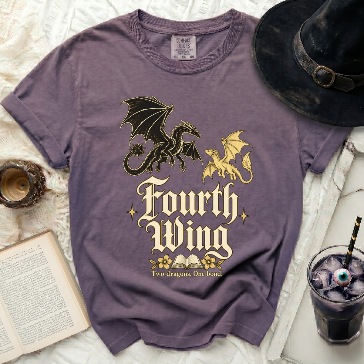 Purple t-shirt with "Fourth Wing" text and two dragons, open book graphic.