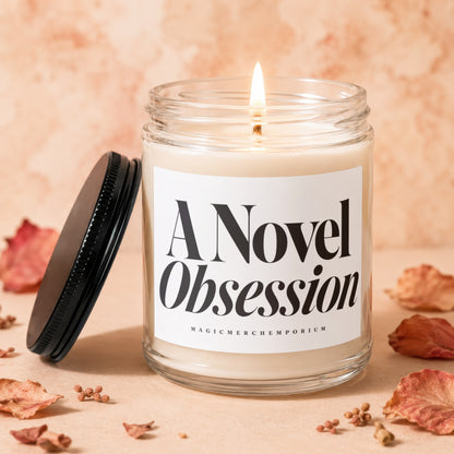 A Novel Obsession candle in a glass jar with a lit wick and black lid.