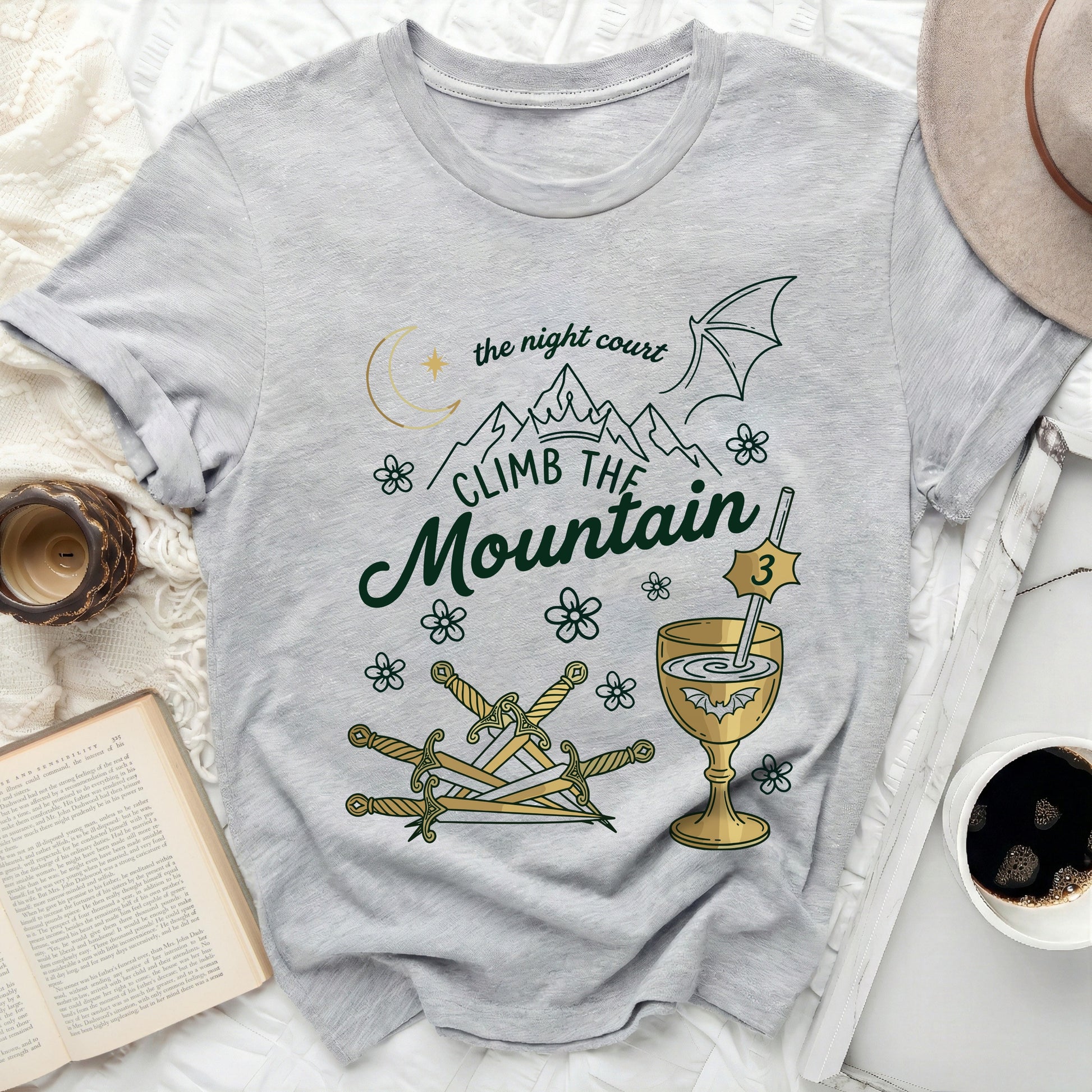 The Night Court Climb The Mountain Swords Goblet 3 T-Shirt
Night Court
Climb Mountain
Fantasy Shirt
Bookish Apparel
Fae Realm
Moon Star
Dragon Wing
Swords Design
Goblet Icon
SJM Inspired
ACOTAR Fan
Book Lover
Gray TShirt
Green Design
Gold Accents
Reader Gift
Unique Graphic
Fictional Worlds
Adventure Theme
Pop Culture