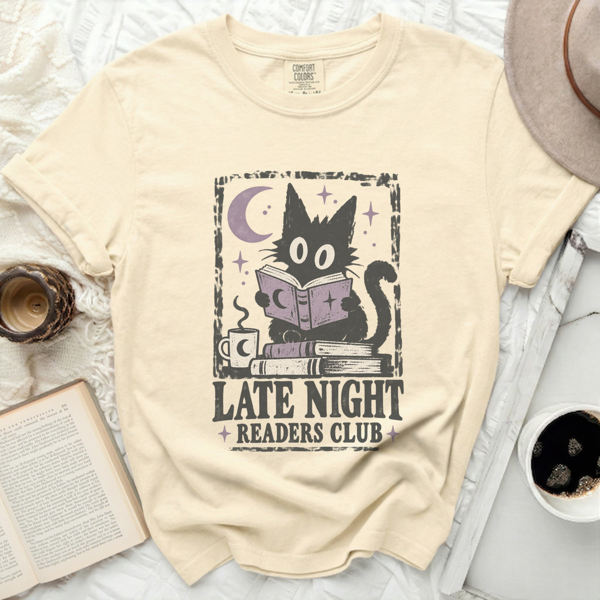 Black cat reading a book with "Late Night Readers Club" text.