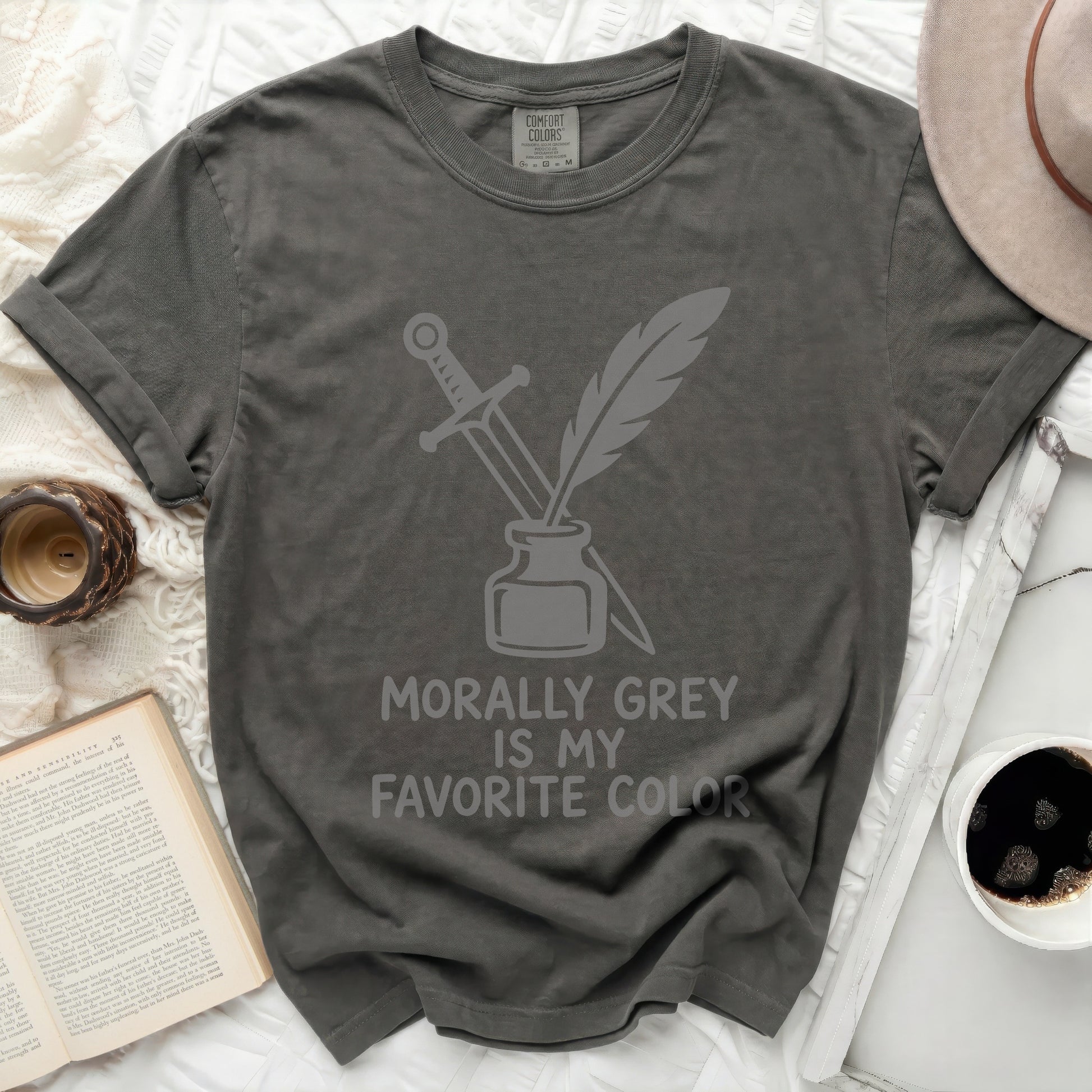 Dark grey t-shirt with sword and quill design and text "Morally Grey is My Favorite Color".