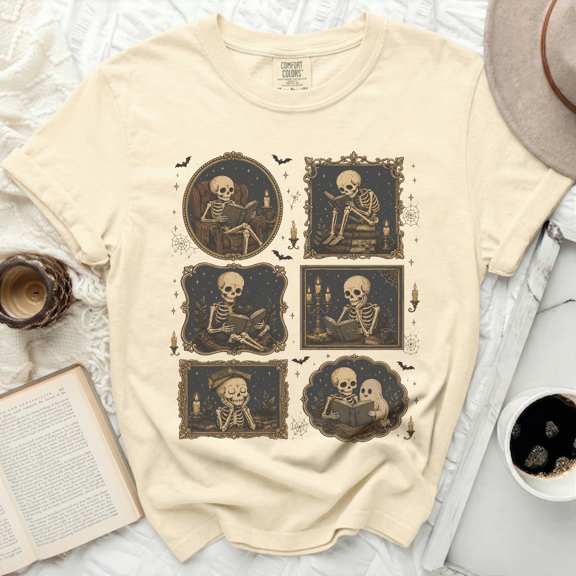 T-shirt with six framed illustrations of skeletons reading and holding books.