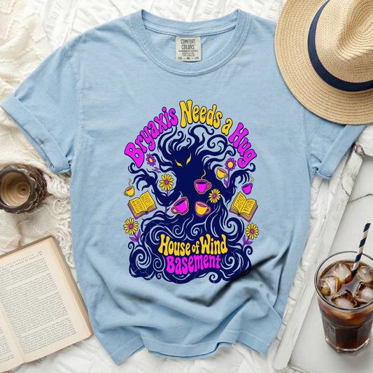 Light blue Comfort Colors t-shirt with a graphic of dark wavy hair and text.