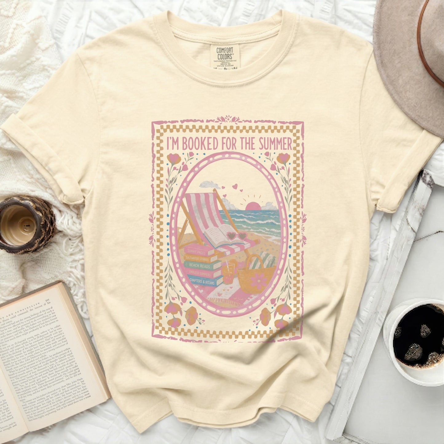 Yellow t-shirt with "I'm Booked for the Summer" and beach reading graphics.
