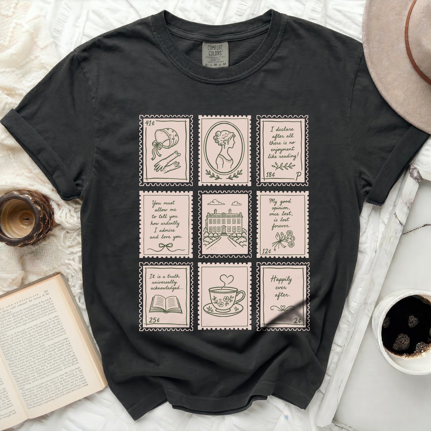 Black Comfort Colors t-shirt with nine illustrated postage stamps.