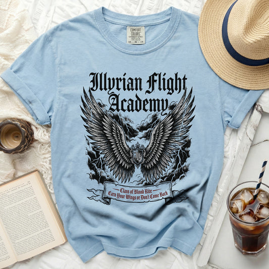 Light blue t-shirt with "Illyrian Flight Academy" and wings graphic.