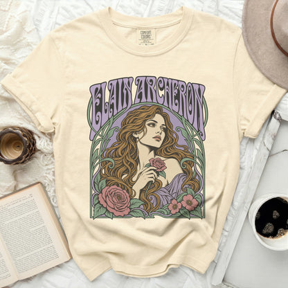 Cream t-shirt with "Blain Archeron" text and vintage art nouveau woman with roses.