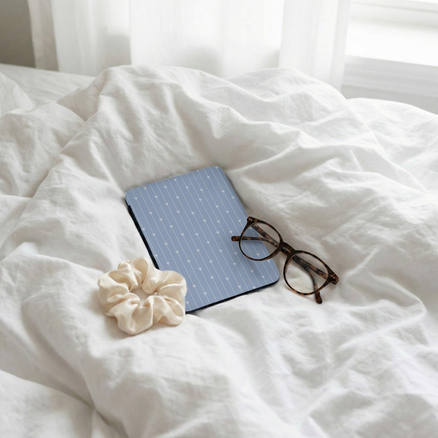 Stylish Eyewear with Hardcover Book on Bed product