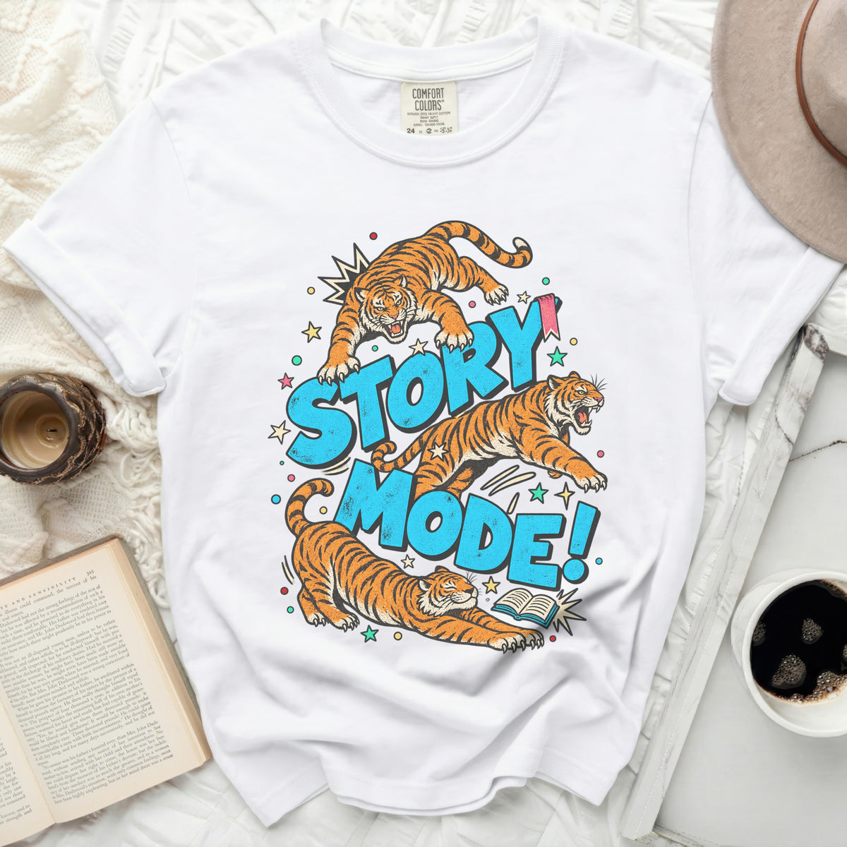 White t-shirt with tigers jumping and the text "STORY MODE!"