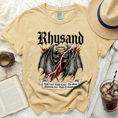 Yellow t-shirt with Rhysand, wings, crown, lightning, and text.