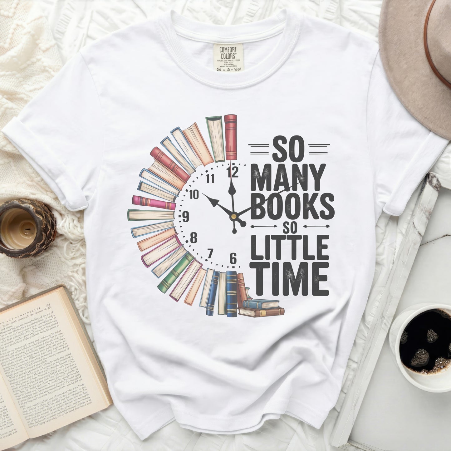 White t-shirt with "So Many Books So Little Time" text design shaped like a clock.