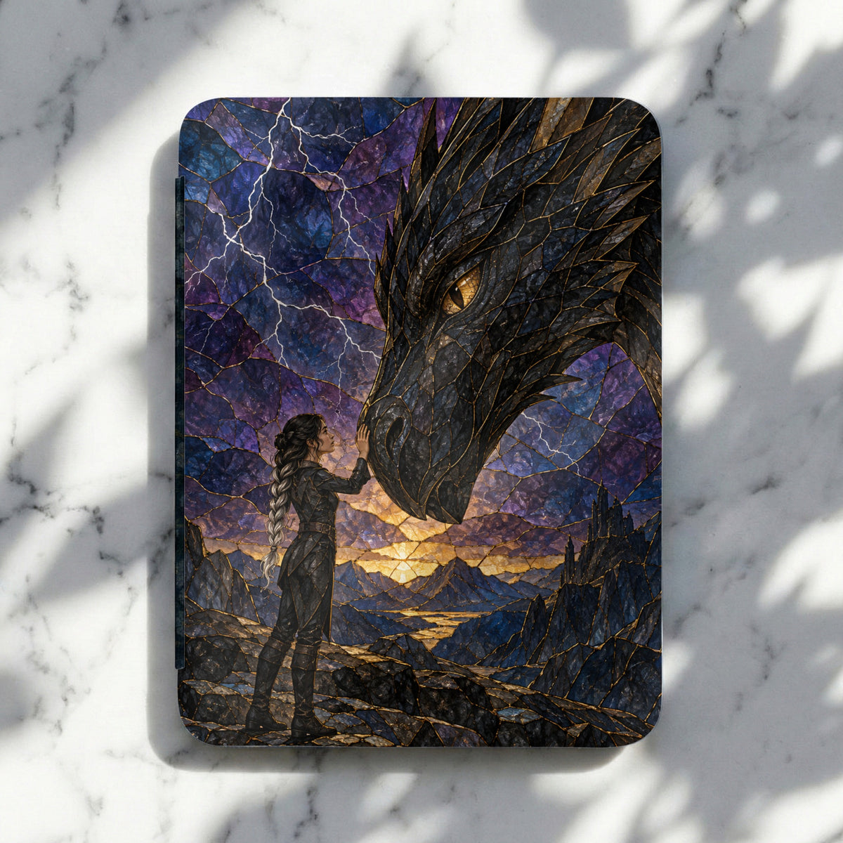 Woman touches a dragon's nose against a stormy, mountainous background.