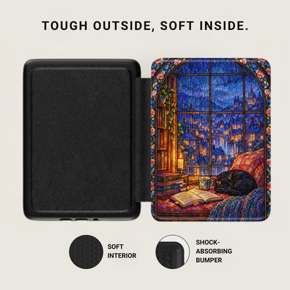 Open e-reader case displaying a black interior on the left and a stained-glass style fantasy window scene on the right.