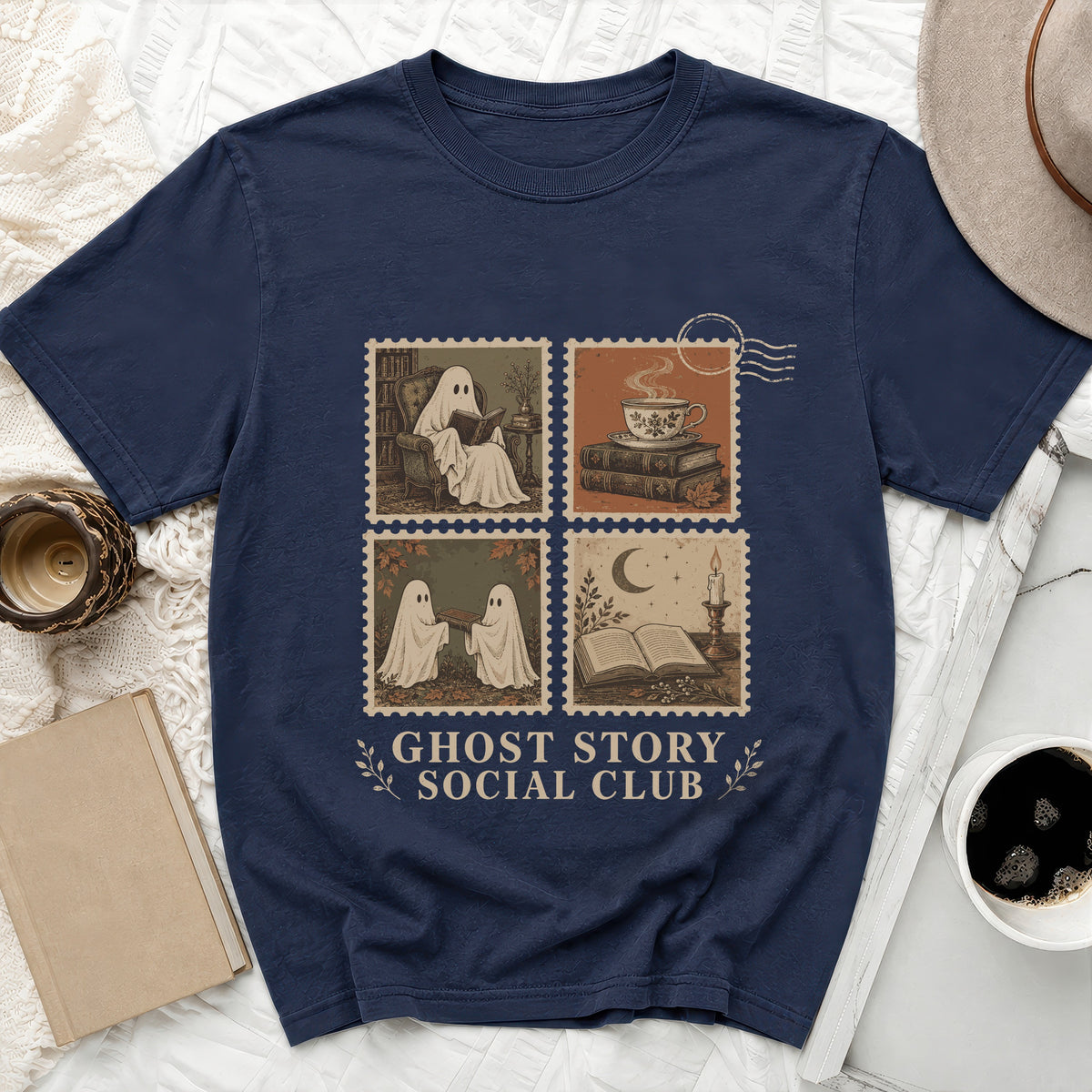 Navy t-shirt with "Ghost Story Social Club" and four postage stamp illustrations.