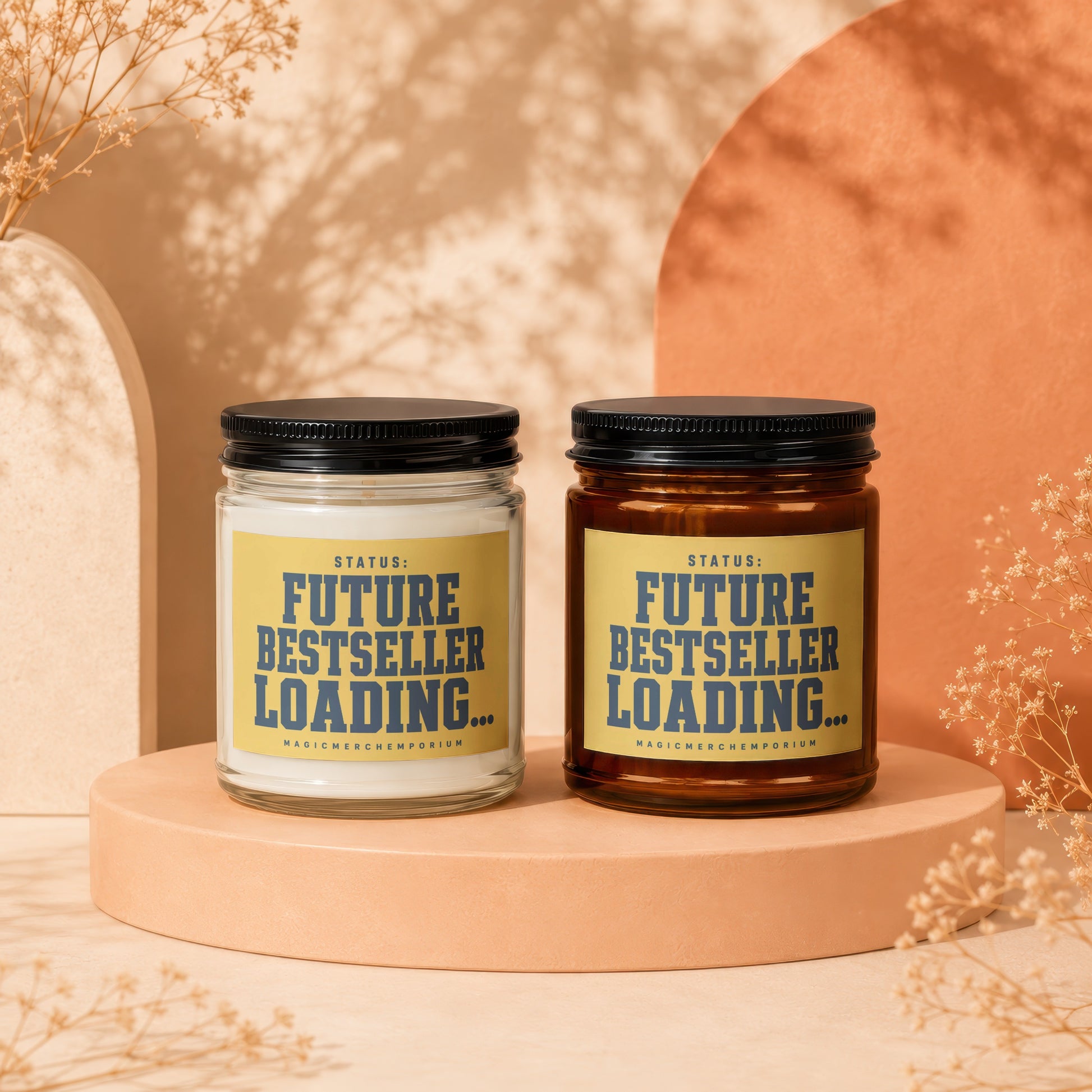 Two candles with labels reading "STATUS: FUTURE BESTSELLER LOADING..." with "MAGICMERCH]EMPORIUM" below.