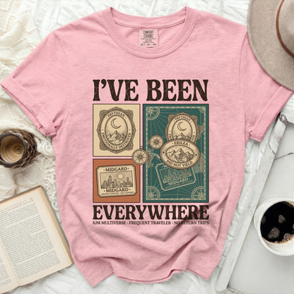 Pink t-shirt with "I'VE BEEN EVERYWHERE" graphic and travel stamps.