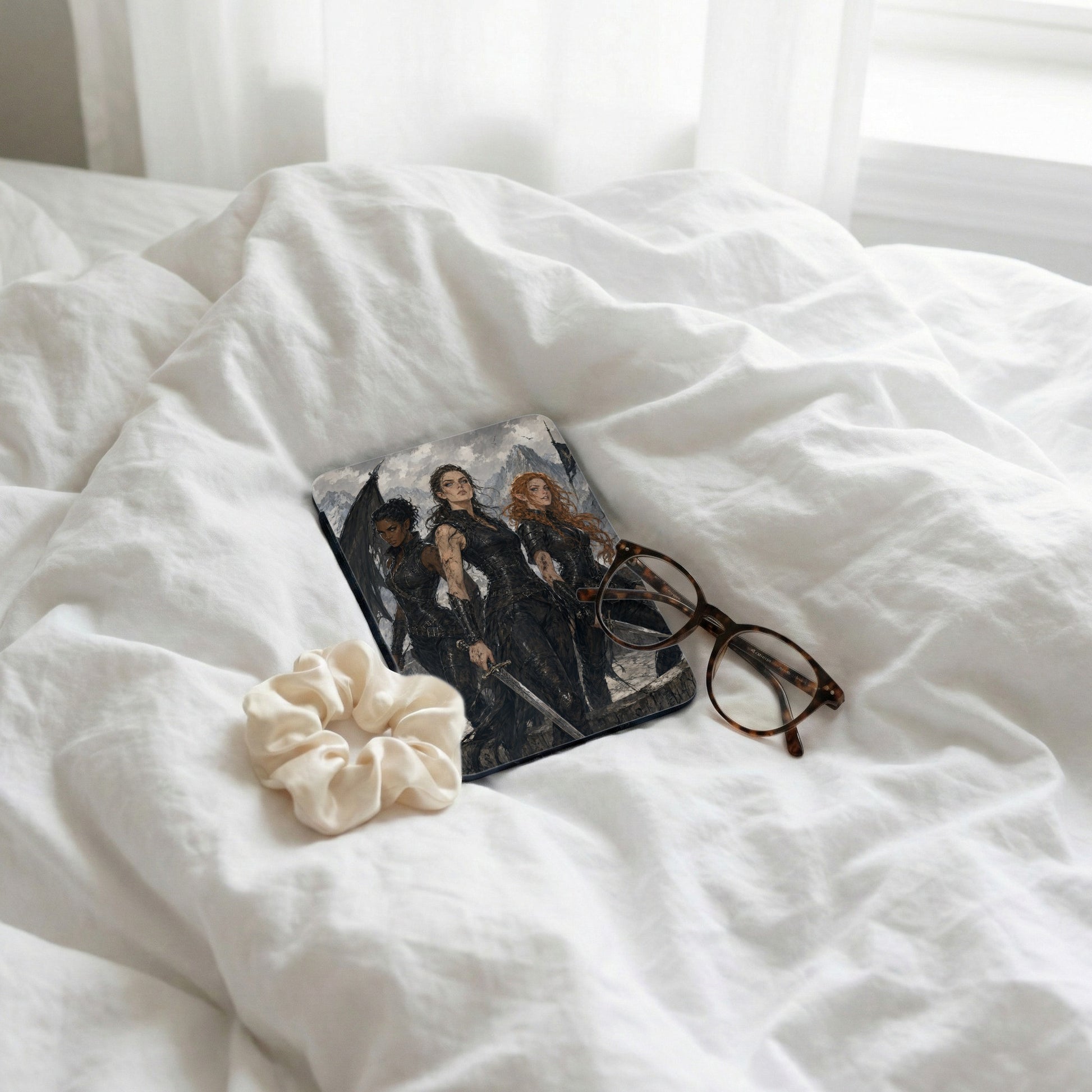 Book cover featuring three women with swords and glasses on white sheets.