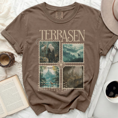 Brown t-shirt with "Terrasen" text and four fantasy postage stamp-style scenes.