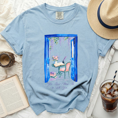 Light blue Comfort Colors t-shirt with blue doorway watercolor design.