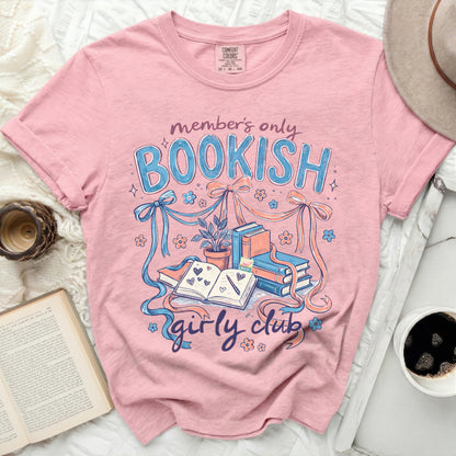 Pink t-shirt with "Bookish Girly Club" text and book illustrations.