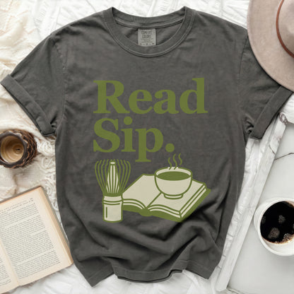 Gray t-shirt with "Read Sip." and book with tea graphic.