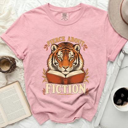 Pink t-shirt with tiger reading book graphic that says "Fierce About Fiction."