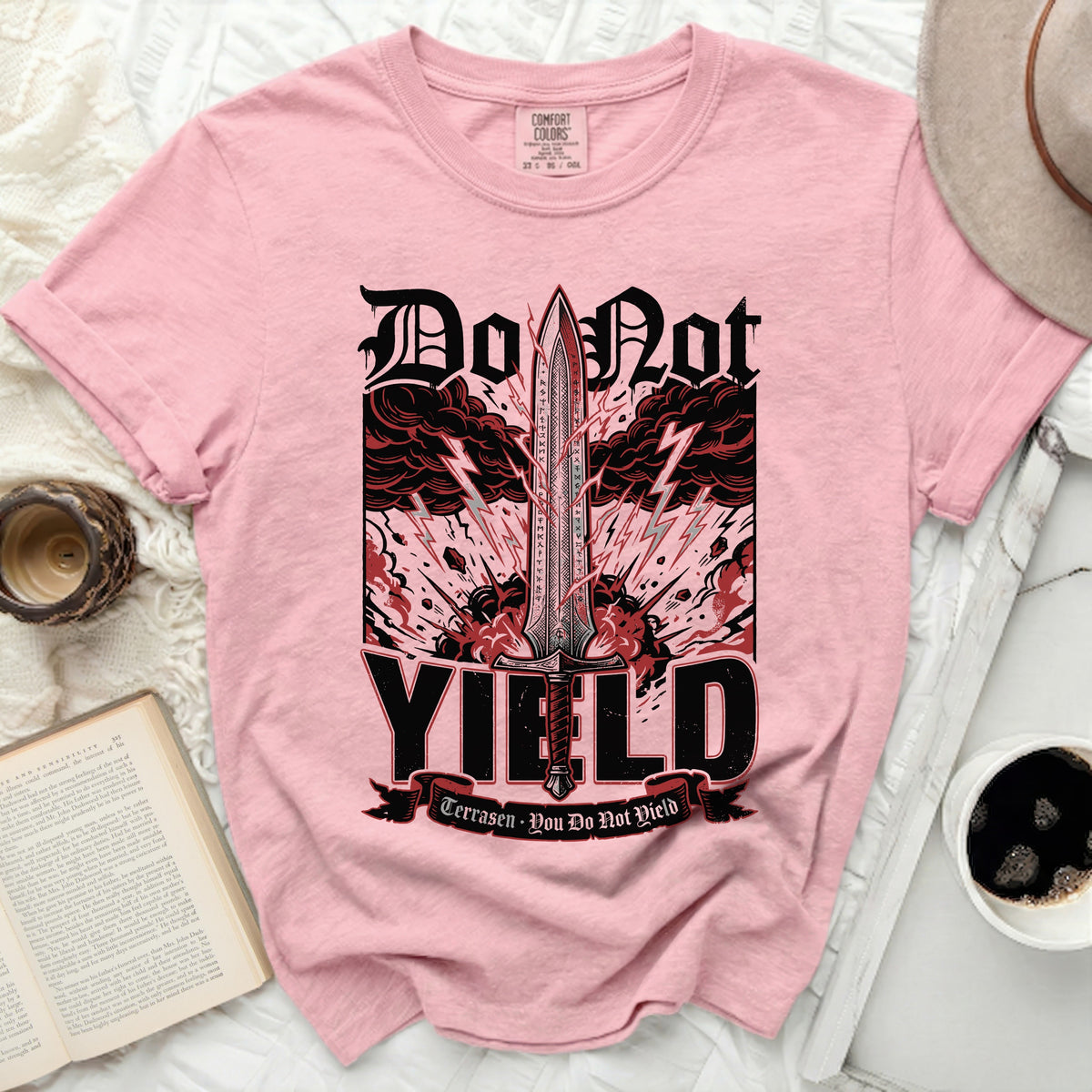 Pink Comfort Colors t-shirt with "Do Not YIELD" sword graphic and text.